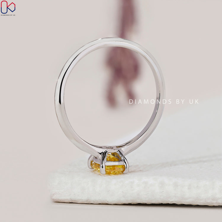 Handmade jewellery showcasing a beautiful yellow diamond.
