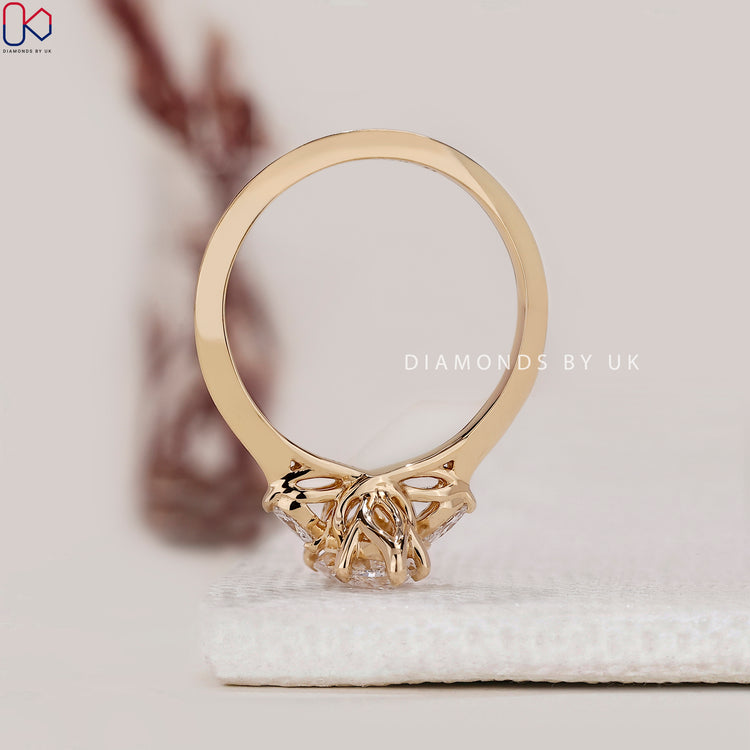 Lab grown marquise cut diamond engagement ring.
