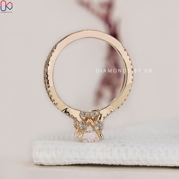 Handmade ring featuring a classic twisted band ring and dazzling side stone engagement ring.