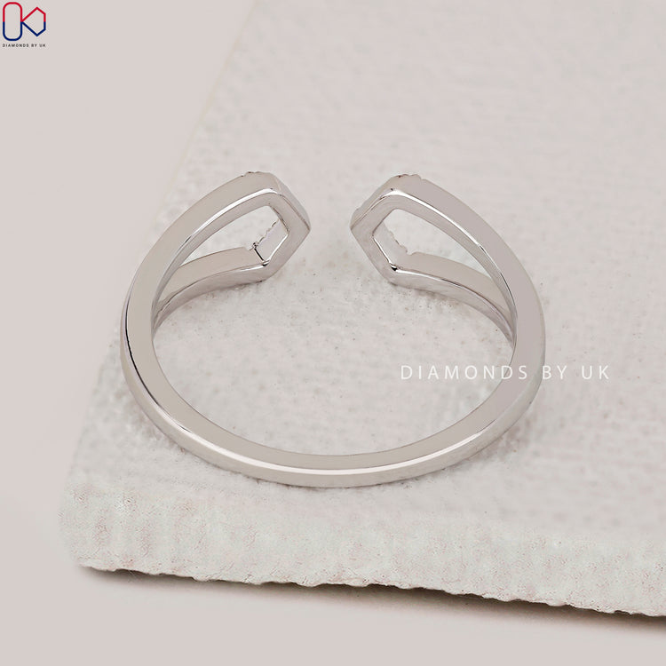 Customize ring with geometric cuff and lab grown diamond.
