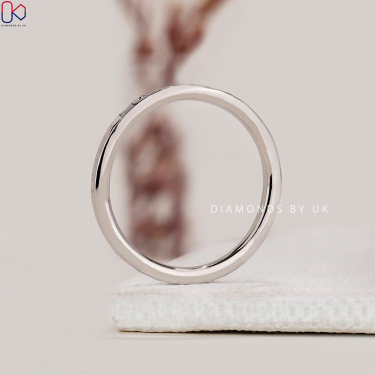 Buy wedding band in hammered sterling band style.
