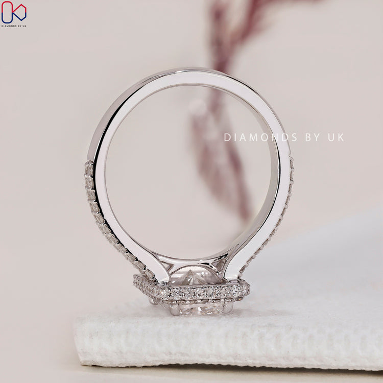 Split shank pave engagement ring with a stunning radiant cut diamond.