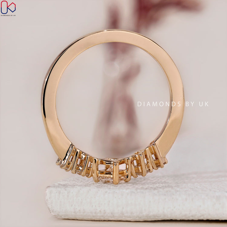 Lab-grown diamond engagement ring in yellow gold.
