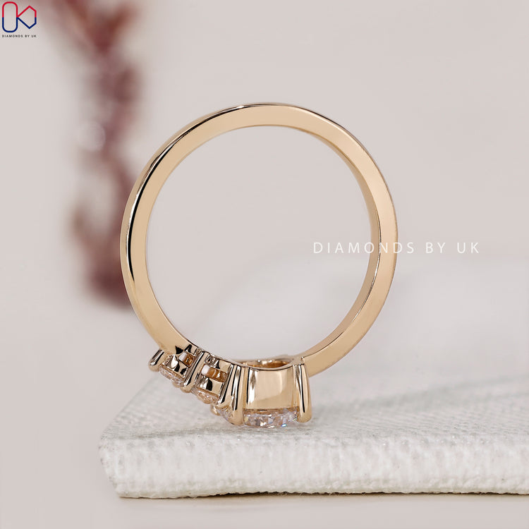 Side Stone Ring crafted for extra brilliance.
