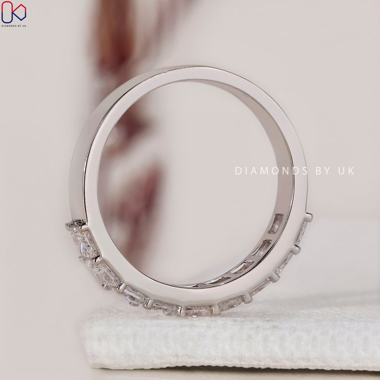 White gold wedding band with a channel set eternity band design.
