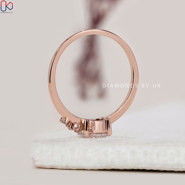 Diamondsbyuk engagement ring featuring an oval diamond.
