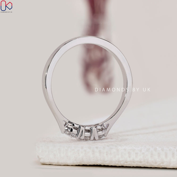 Lab grown diamond 3 stone band set in classic white gold.
