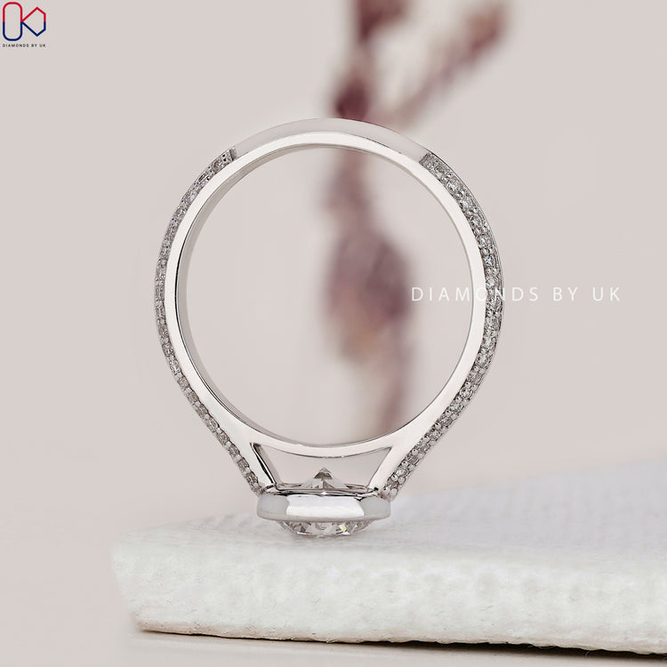 Bezel set engagement ring crafted in white gold with Lab Grown Diamond.
