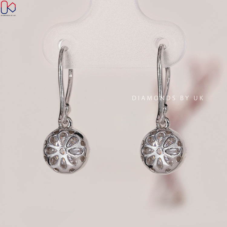 Lab grown diamond earrings for ethical luxury.

