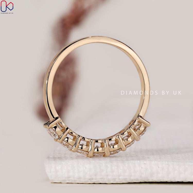 Handmade jewellery with prong setting band.
