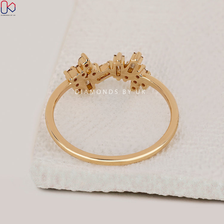 Customize ring with cluster setting and yellow gold finish.
