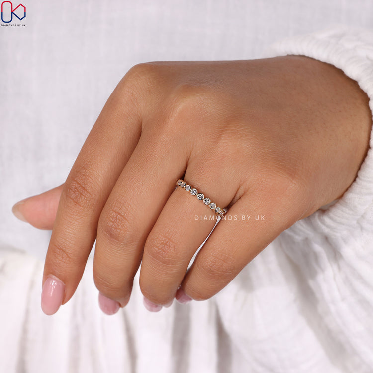Stunning yellow gold eternity band with continuous diamonds for lasting sparkle.
