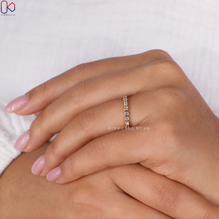 Lab Grown Diamond yellow gold wedding band offering brilliance and sustainability.
