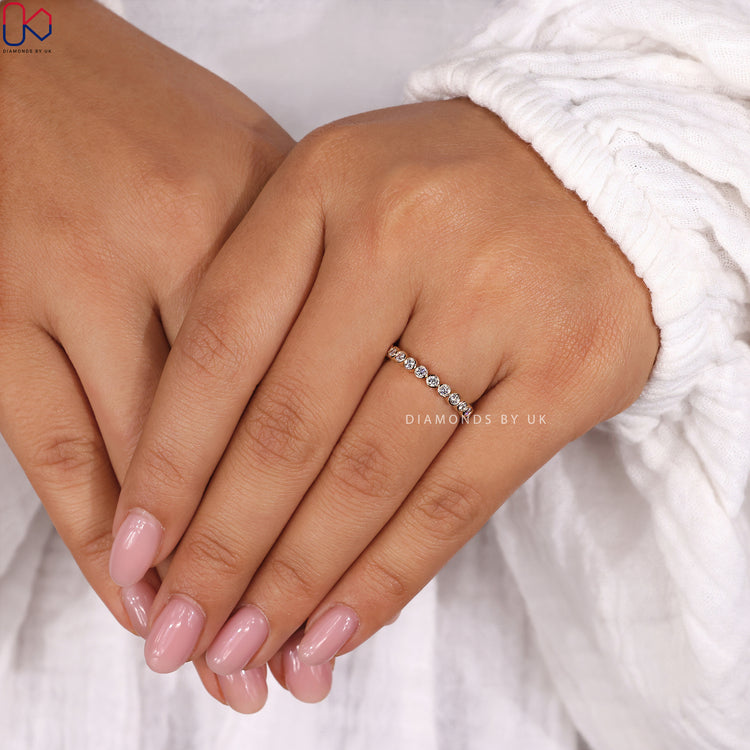 Handmade ring with yellow gold setting and brilliant round diamonds.
