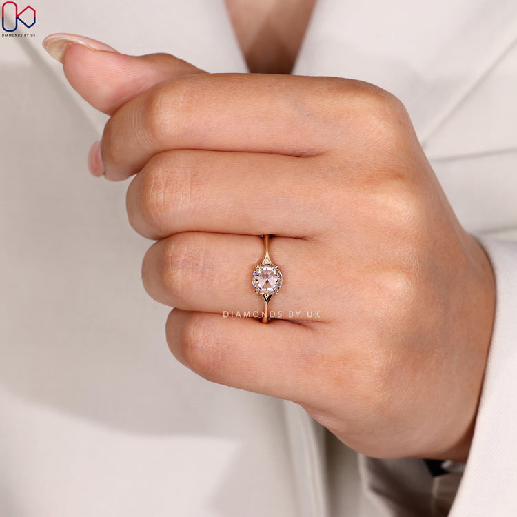 Split shank band crafted to hold a rose cut diamond in a balanced yellow gold frame.