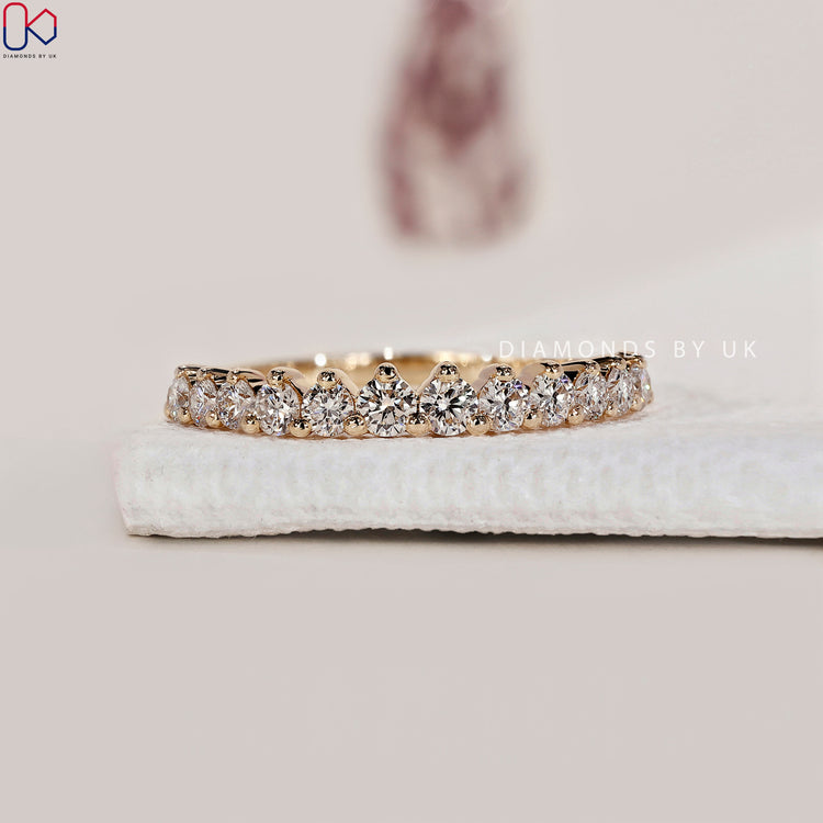 Diamondsbyuk wedding band with handcrafted detail and eco-friendly stones.