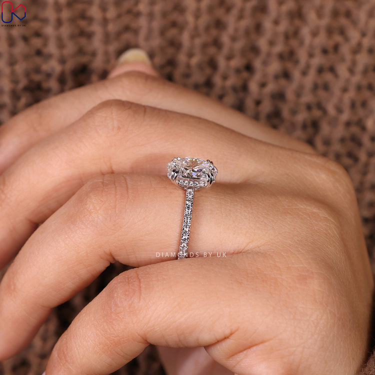 White gold ring with a brilliant cut diamond.
