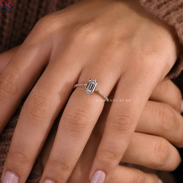 Diamondsbyuk engagement ring with emerald diamond engagement ring.
