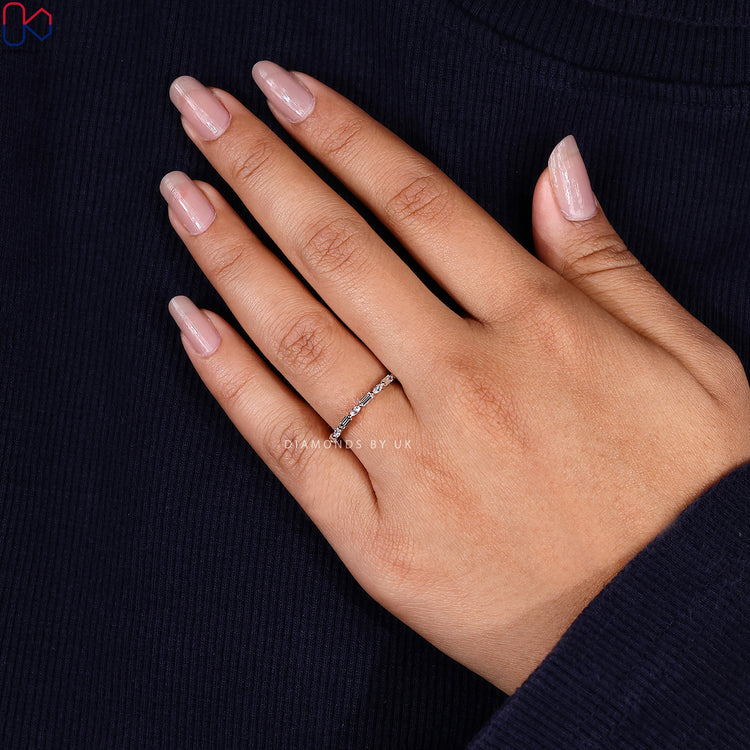 Buy diamond band in yellow gold with custom design options.
