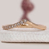 Chevron wedding band with round lab grown diamonds.