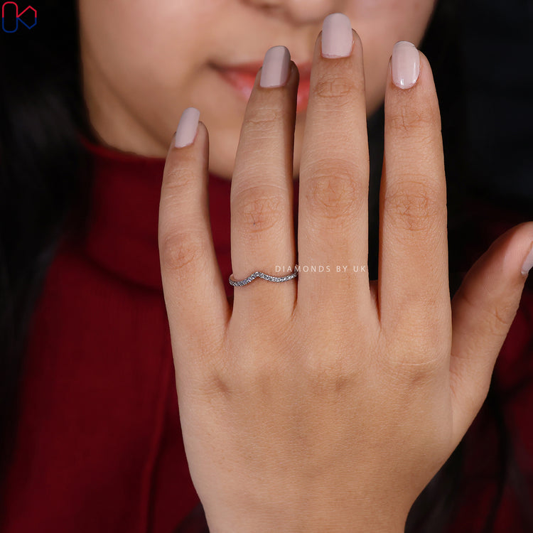 Anniversary gift her will love—a chevron shaped white gold round diamond band.

