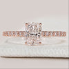 Cushion cut ring with hidden halo and pavé band.