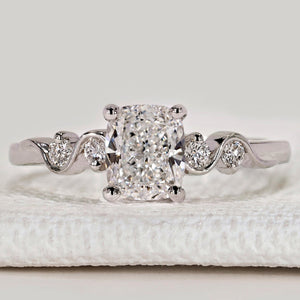 Cushion Cut Diamond Ring with Round Side Stones