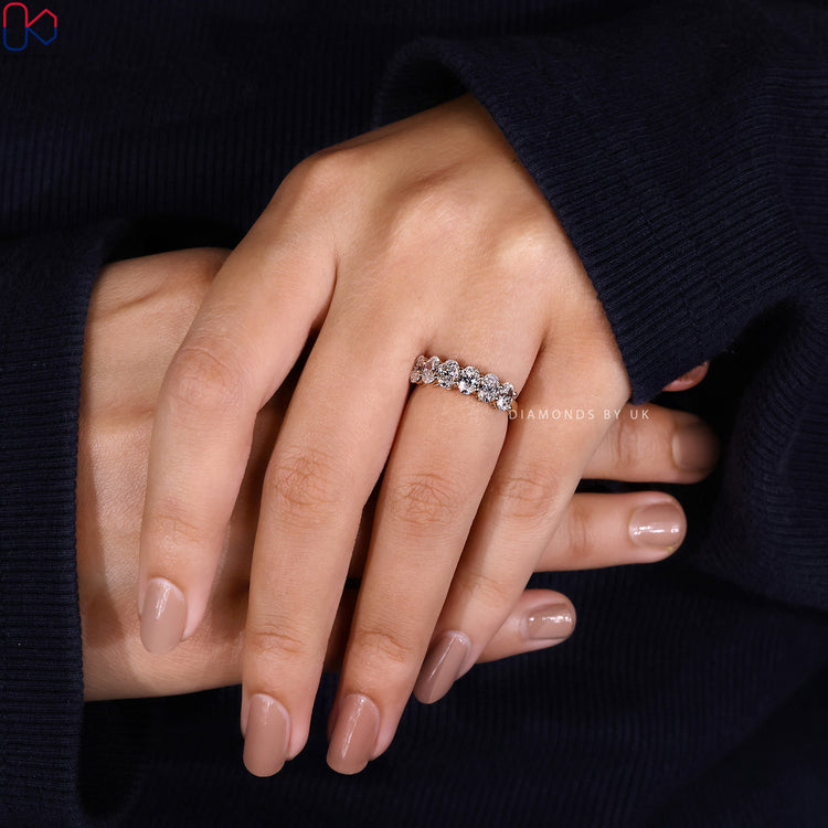 Stacking band crafted with oval cut stones, ideal for mixing and matching.

