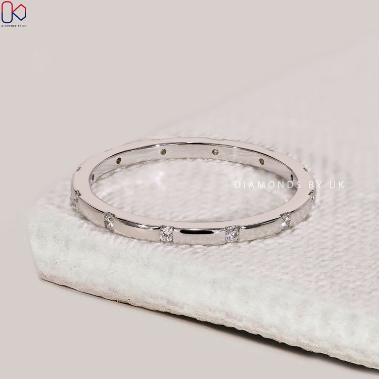 Distance Pave Wedding Band In Gypsy Setting