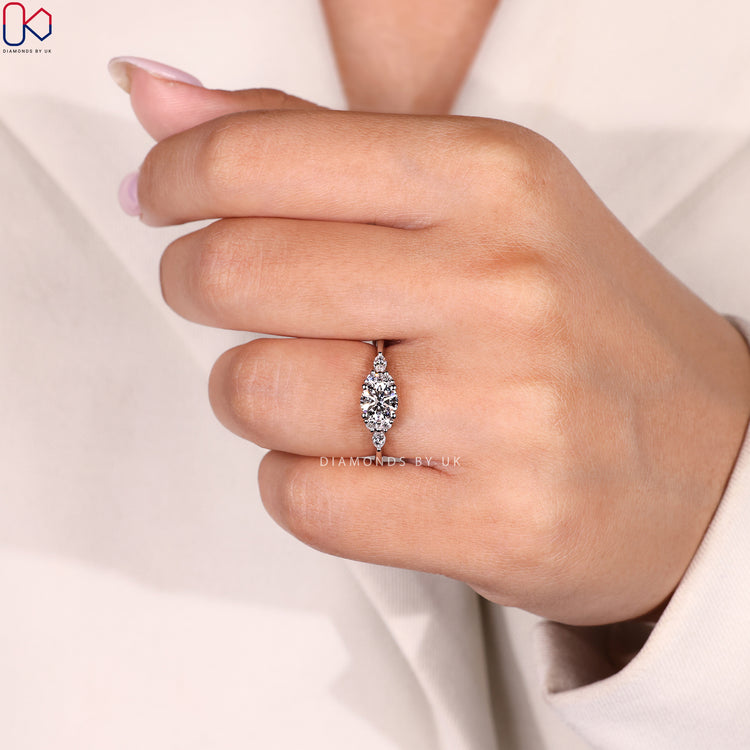 Muse setting round cut ring with tapered shank.