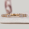 Round and marquise cut diamond Band with shared prong pavé.