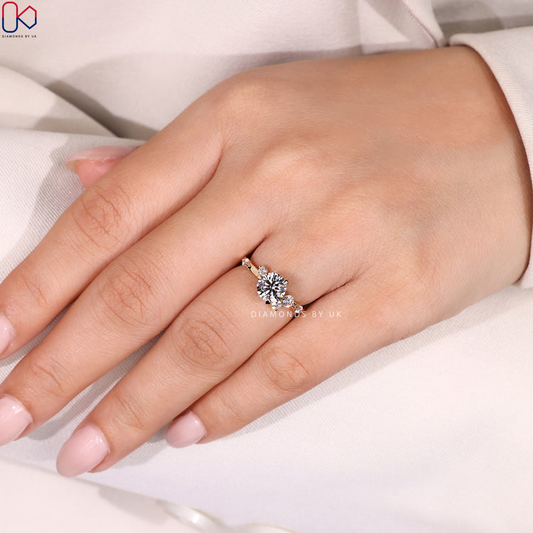 Round engagement ring with three claw prong setting.
