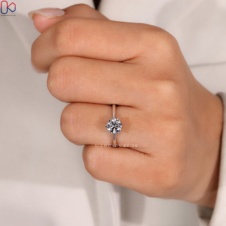 Cathedral solitaire ring with round lab grown diamond.
