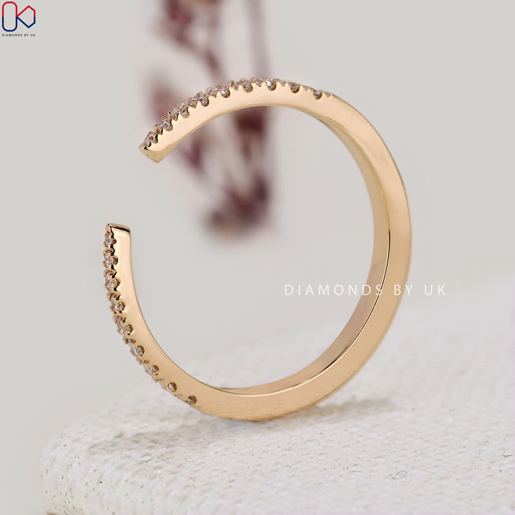 Round lab grown diamond band with an open gap design.