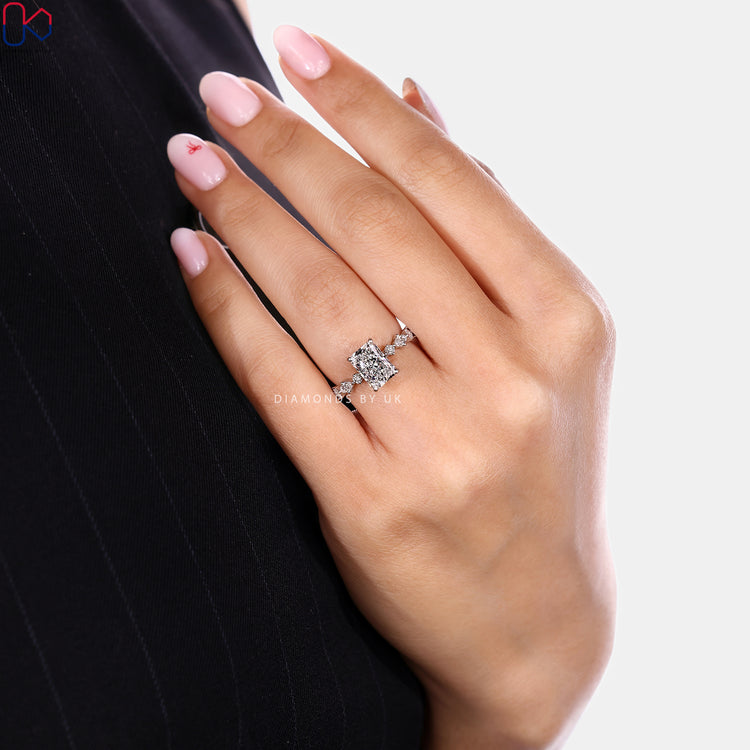 Radiant cut lab grown diamond ring with hidden halo.

