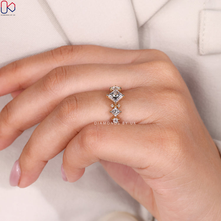 Lab grown princess ring with knife edge shank.