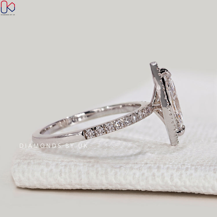 Handmade marquise ring with two claw prong setting.
