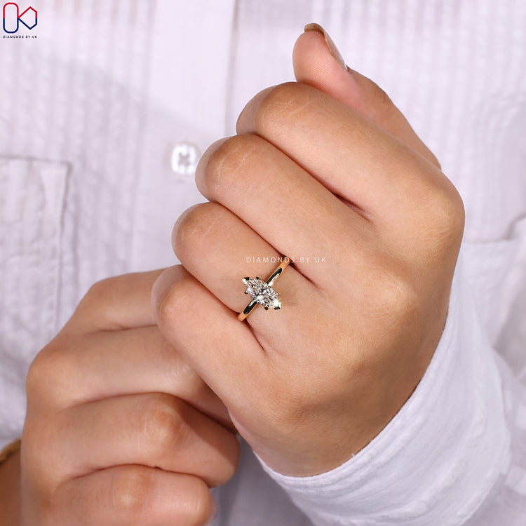 Marquise cut ring with V and claw setting style.