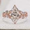 Nature inspired engagement ring with marquise diamond.
