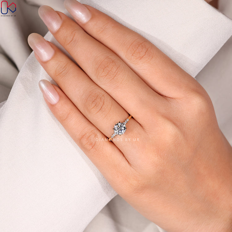 Lab grown round cut ring with seven stone design.