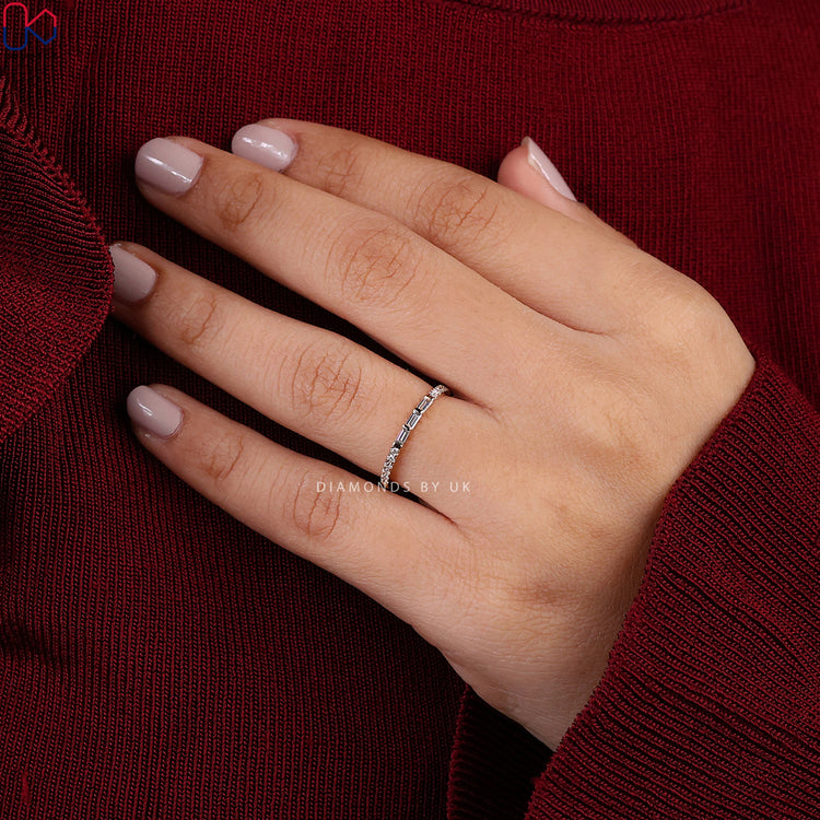 Lab grown diamond band with baguette and round stones.
