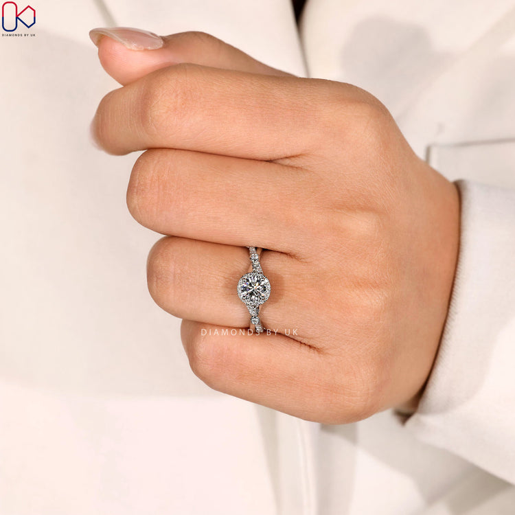 Cathedral round ring with four prong setting.
