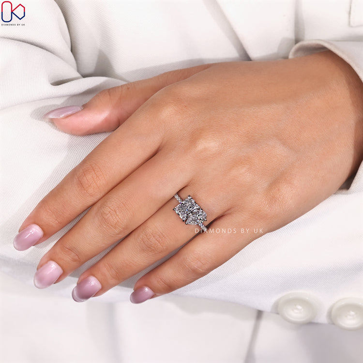 Toi et Moi ring with four compass prong design.