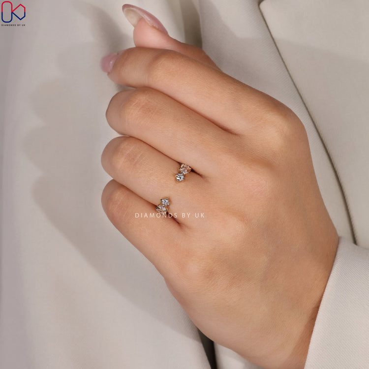 Open gap band with round diamonds and prong setting.