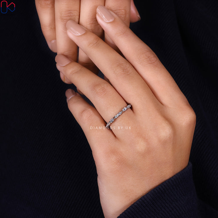 Half eternity diamond band with round and marquise stones.
