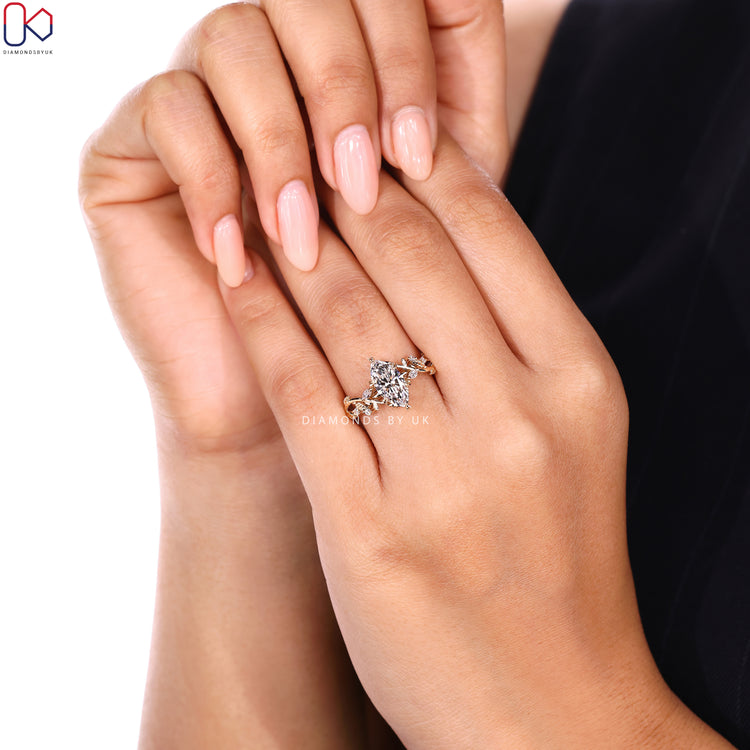 Diamondsbyuk marquise diamond ring with leaf style prongs.
