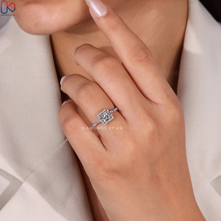 Four claw princess ring with cathedral setting.
