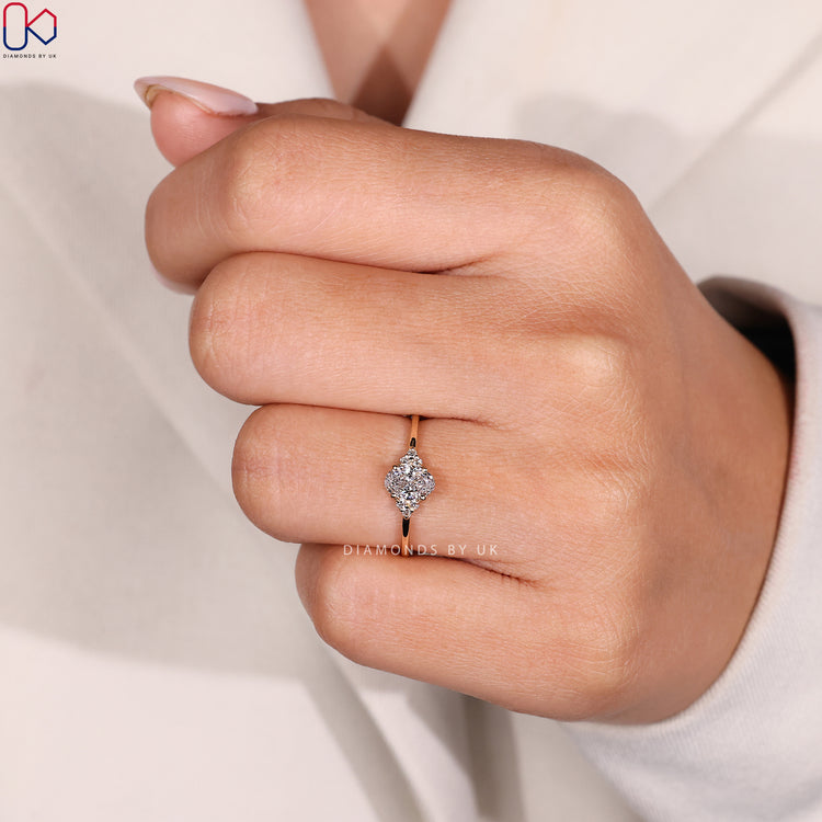 Seven stone oval cut ring with muse setting.