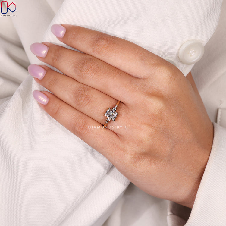 Radiant cut ring with double prong design.