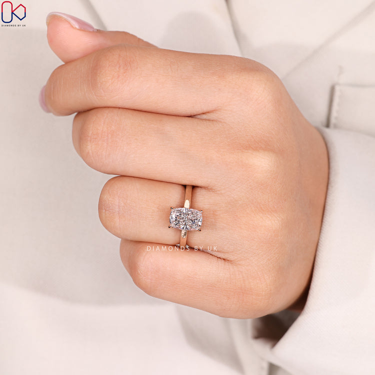 Four claw cushion diamond ring with solitaire style.